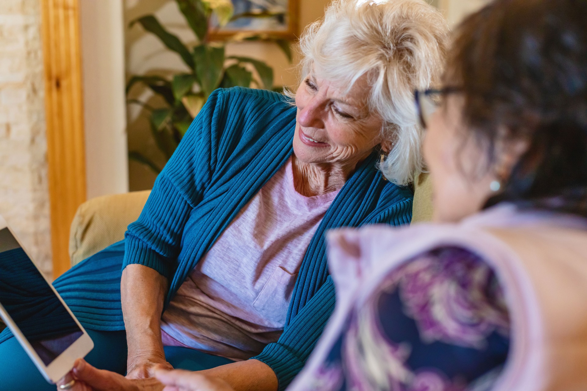 Senior Caucasian and Korean Female Friends in Home Setting Spending Quality Time Together in Various Activities Seniors Healthy Living Photo Series